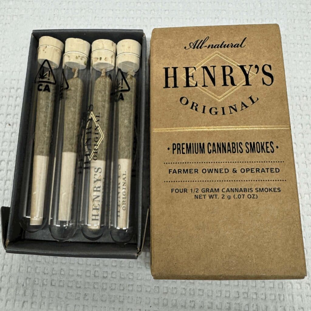 All-natural Henry’s Original Premium Cannabis Smokes” White Rhino pre-roll front and interior of package